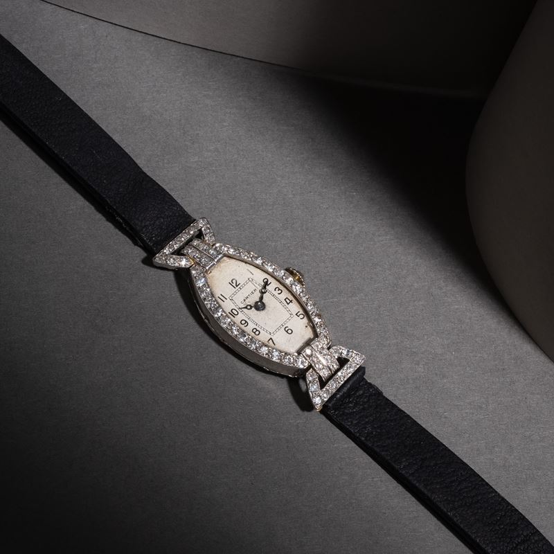 Cartier - Orologio Tonneau solo tempo a carica manuale in platino con quadrante bianco e cassa in...