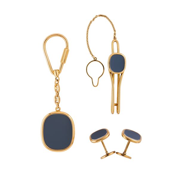 PATEK PHILIPPE - PATEK PHILIPPE - ELLIPSE SET COMPOSTO DA GEMELLI, PORTACHIAVI E FERMA CRAVATTA IN ORO GIALLO 18 KT