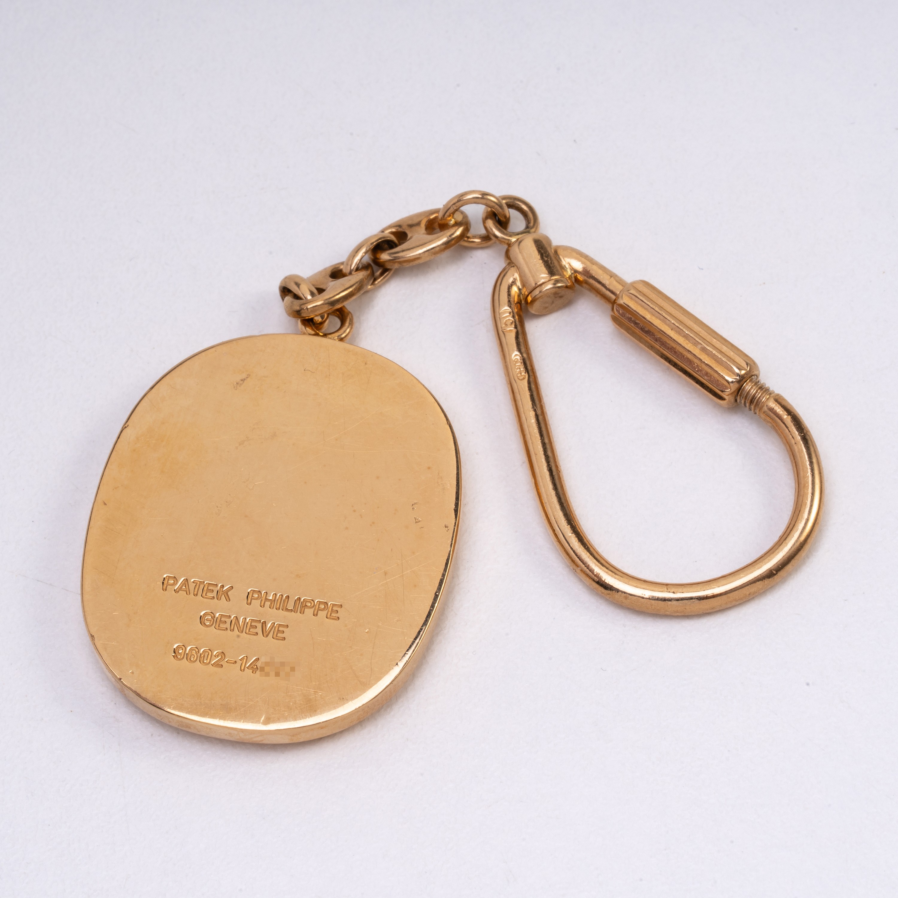 Patek Philippe - Ellipse set in oro giallo 18 kt con gemelli, portachiavi e ferma cravatta