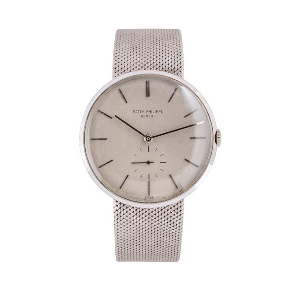 PATEK PHILIPPE - PATEK PHILIPPE - CALATRAVA OROLOGIO SOLO TEMPO A CARICA MANUALE IN ORO BIANCO 18KT CON BRACCIALE IN ORO BIANCO 18KT, QUADRANTE GRIGIO E PICCOLI SECONDI AD ORE SEI.