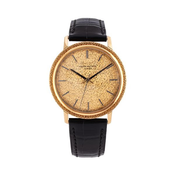 PATEK PHILIPPE - PATEK PHILIPPE - CALATRAVA OROLOGIO SOLO TEMPO A CARICA AUTOMATICA IN ORO GIALLO 18KT CON CASSA E QUADRANTE LAVORATI E INDICI CON LAPISLAZZULI