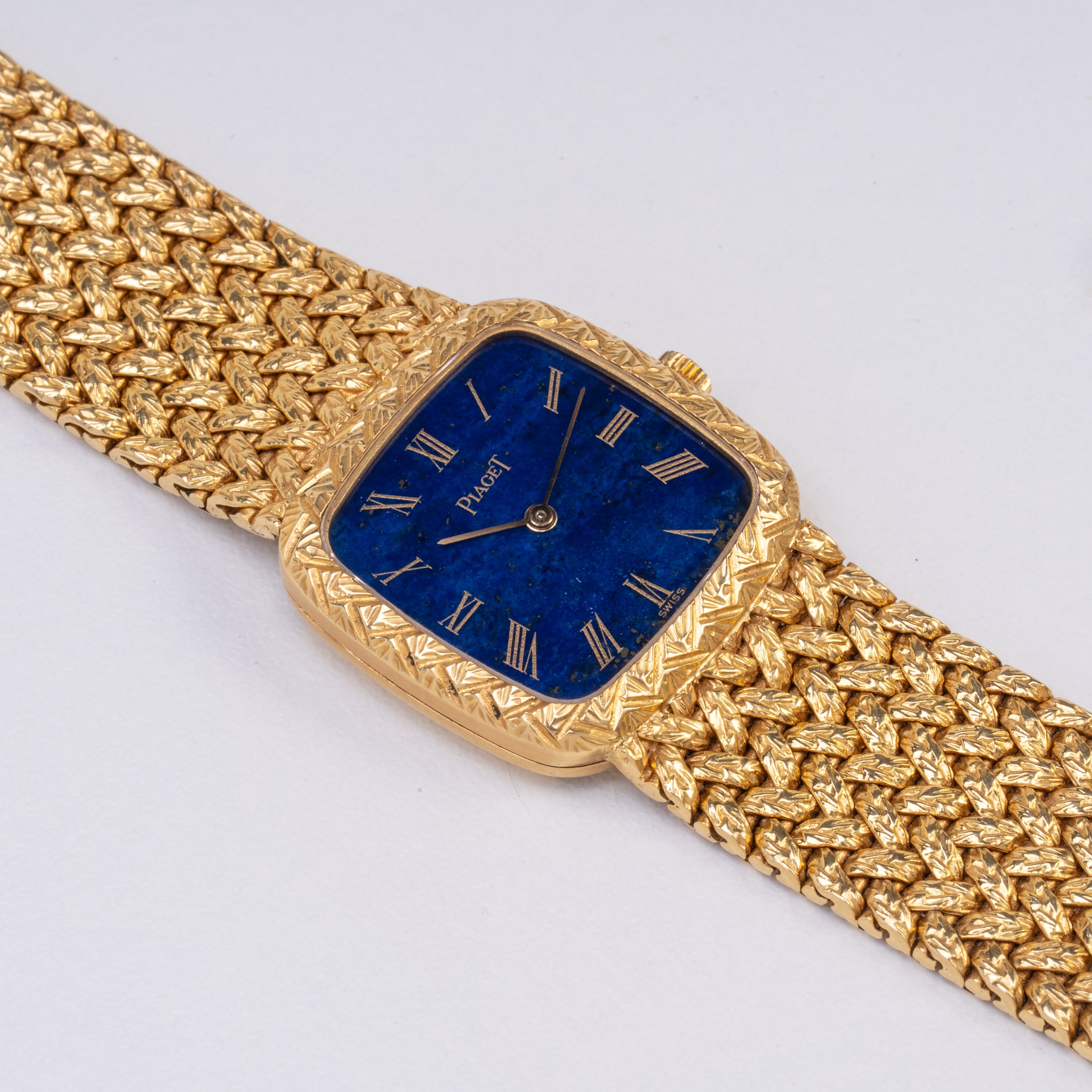 Piaget - Orologio solo tempo con carica manuale in oro giallo 18 kt e quadrante in lapislazzuli