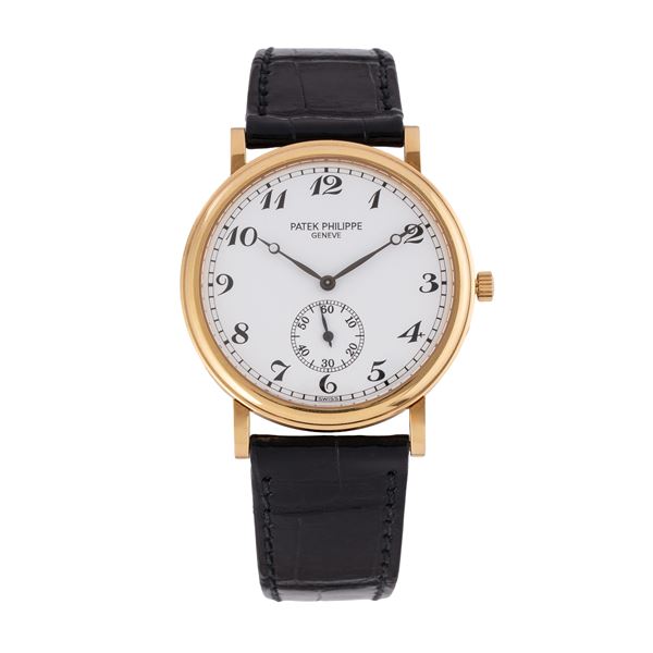 PATEK PHILIPPE - PATEK PHILIPPE - CALATRAVA OROLOGIO SOLO TEMPO A CARICA AUTOMATICA IN ORO GIALLO 18KT CON CASSA A SCALINO, QUADRANTE PORCELLANA CON INDICI E SFERE BREGUET CON PICCOLI SECONDI AD ORE SEI