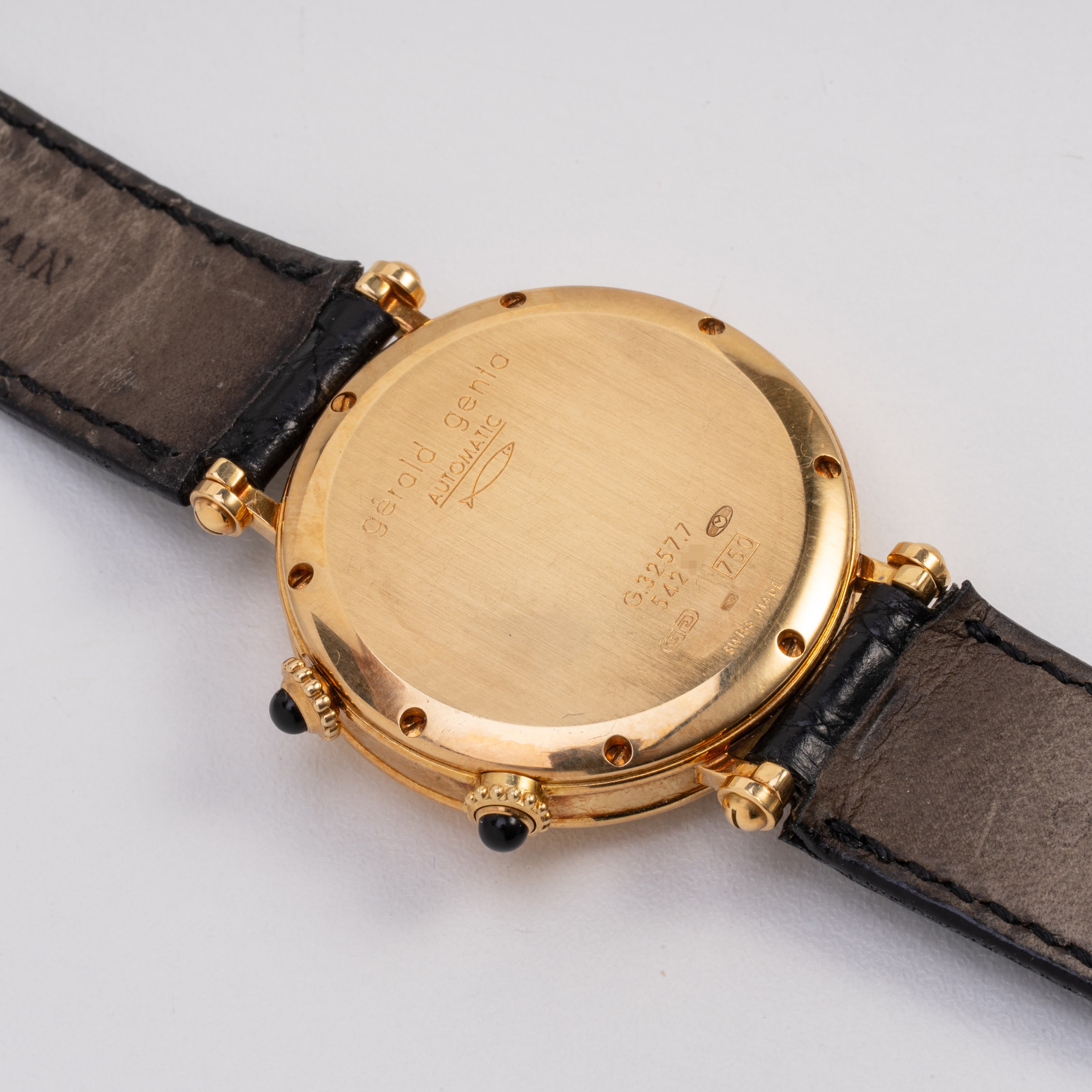 Gerald Genta - Dual Time, orologio solo tempo automatico in oro giallo 18 kt con quadrante bianco...