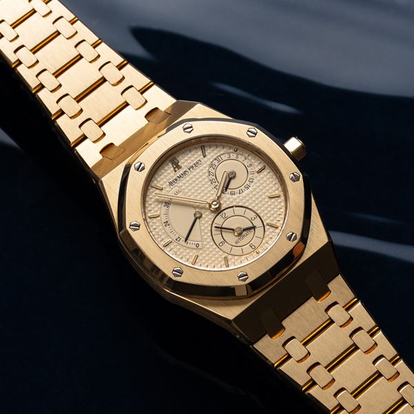 AUDEMARS PIGUET - AUDEMARS PIGUET - ROYAL OAK DUAL TIME POWER RESERVE OROLOGIO SOLO TEMPO A CARICA AUTOMATICA IN ORO GIALLO 18KT CON QUADRANTE TAPISSERIE, DATARIO, RISERVA DI CARICA E DOPPIO FUSO ORARIO