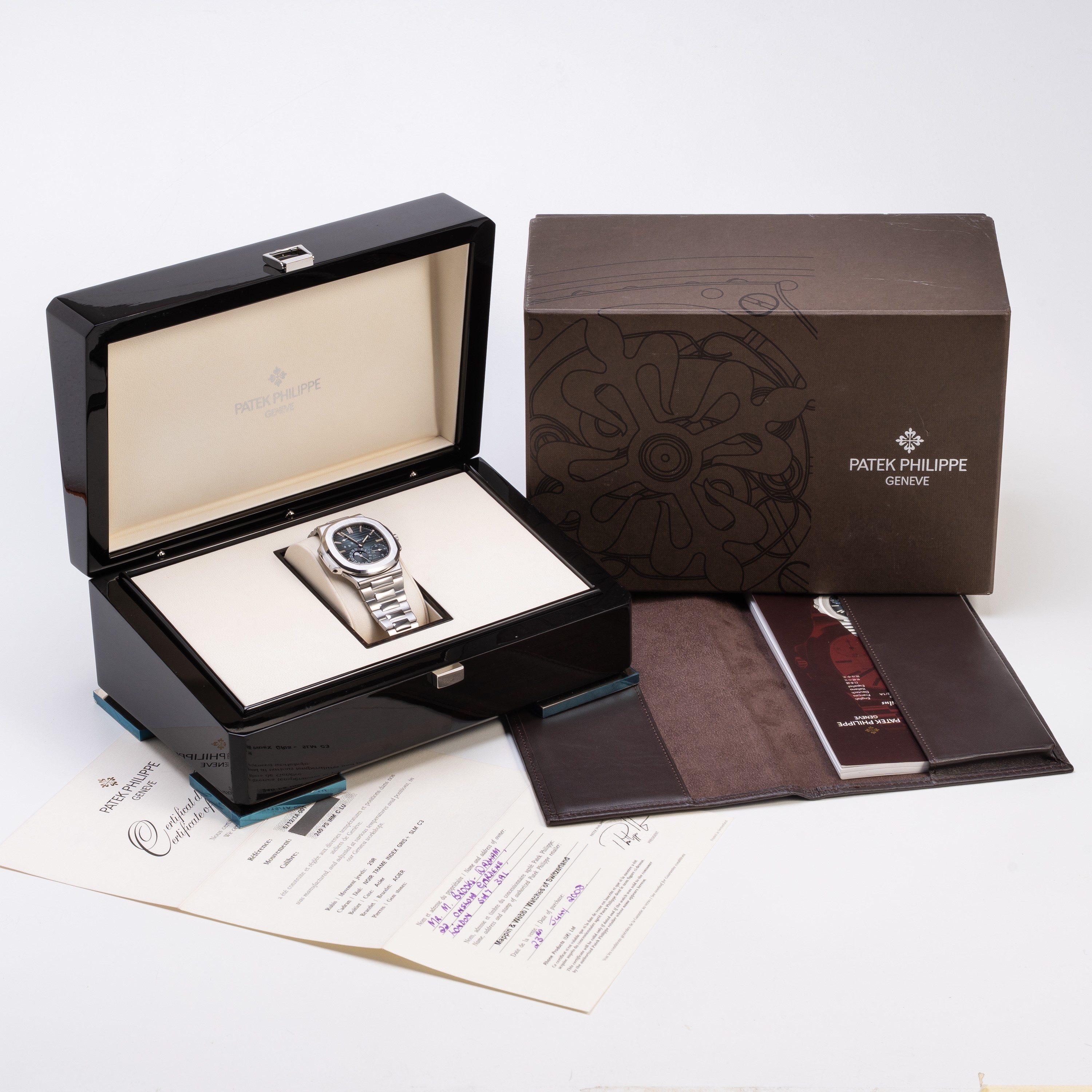 Patek Philippe - Nautilus 5712/1A-001, orologio solo tempo automatico con fasi lunari e datario
