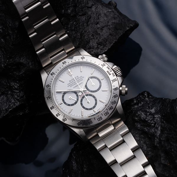 ROLEX - DAYTONA CRONOGRAFO A CARICA AUTOMATICA IN ACCIAIO CON QUADRANTE 'FLOATING' BIANCO E GHIERA CON SCALA TACHMETRICA