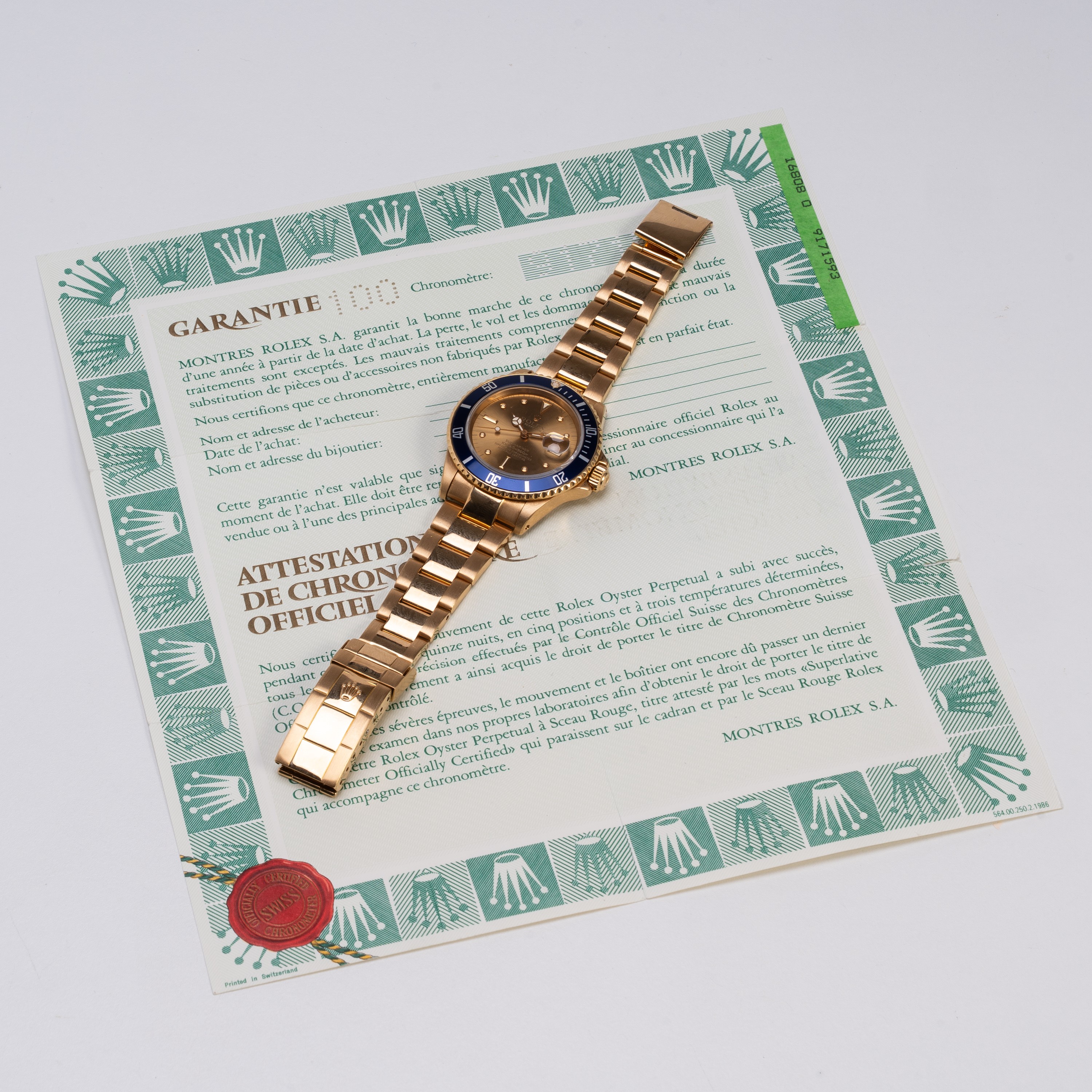 Rolex - Submariner (Ref. 16808), orologio automatico in oro giallo 18 kt con quadrante champagne ...