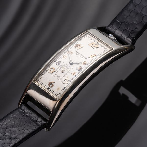 MOVADO - POLYPLAN OROLOGIO SOLO TEMPO A CARICA MANUALE IN ORO BIANCO 18KT CON CASSA 'CURVEX', QUADRANTE BIANCO CON INDICI BREGUET E PICCOLI SECONDI AD ORE SEI.