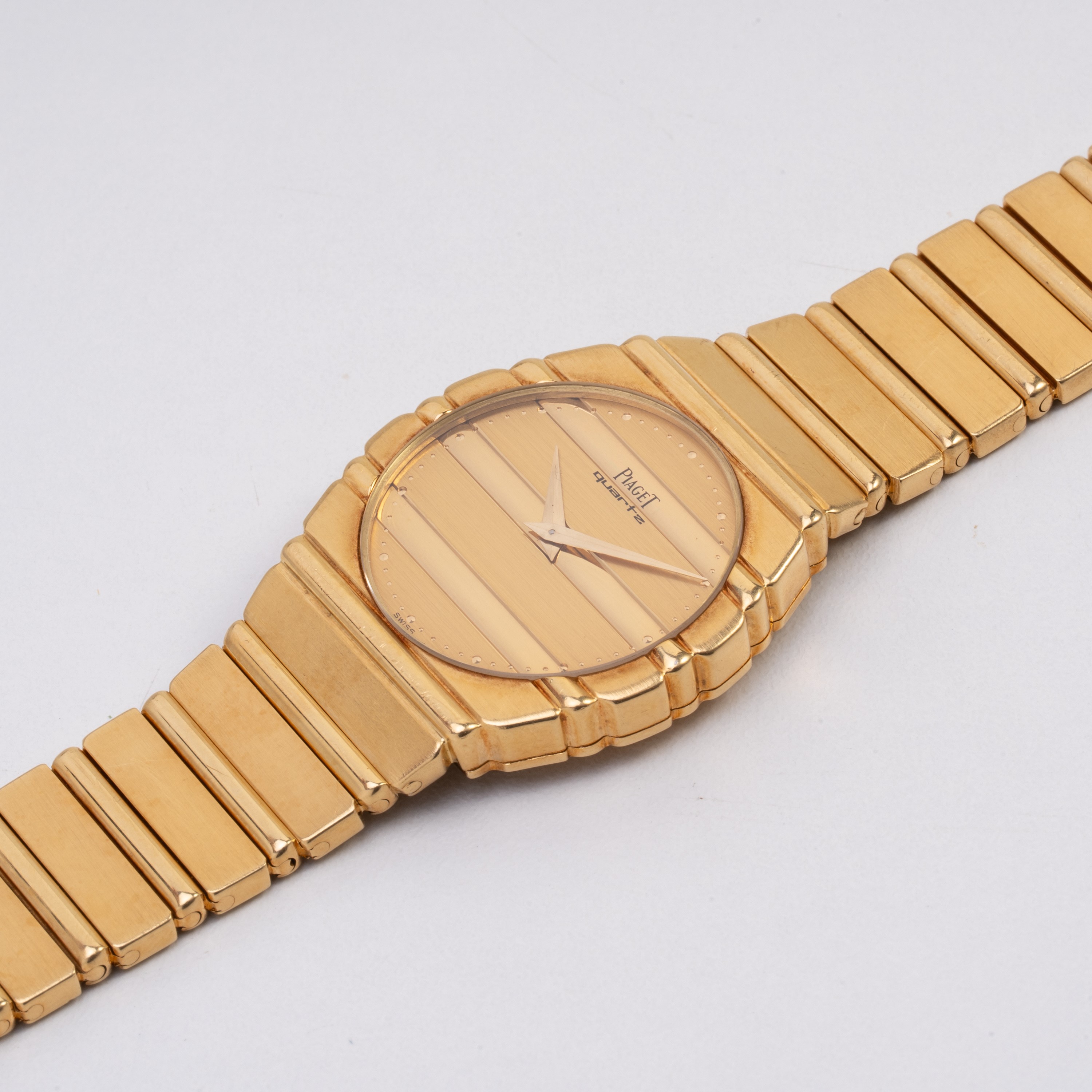 Piaget, Polo, orologio da polso solo tempo in oro giallo 18kt con bracciale integrato