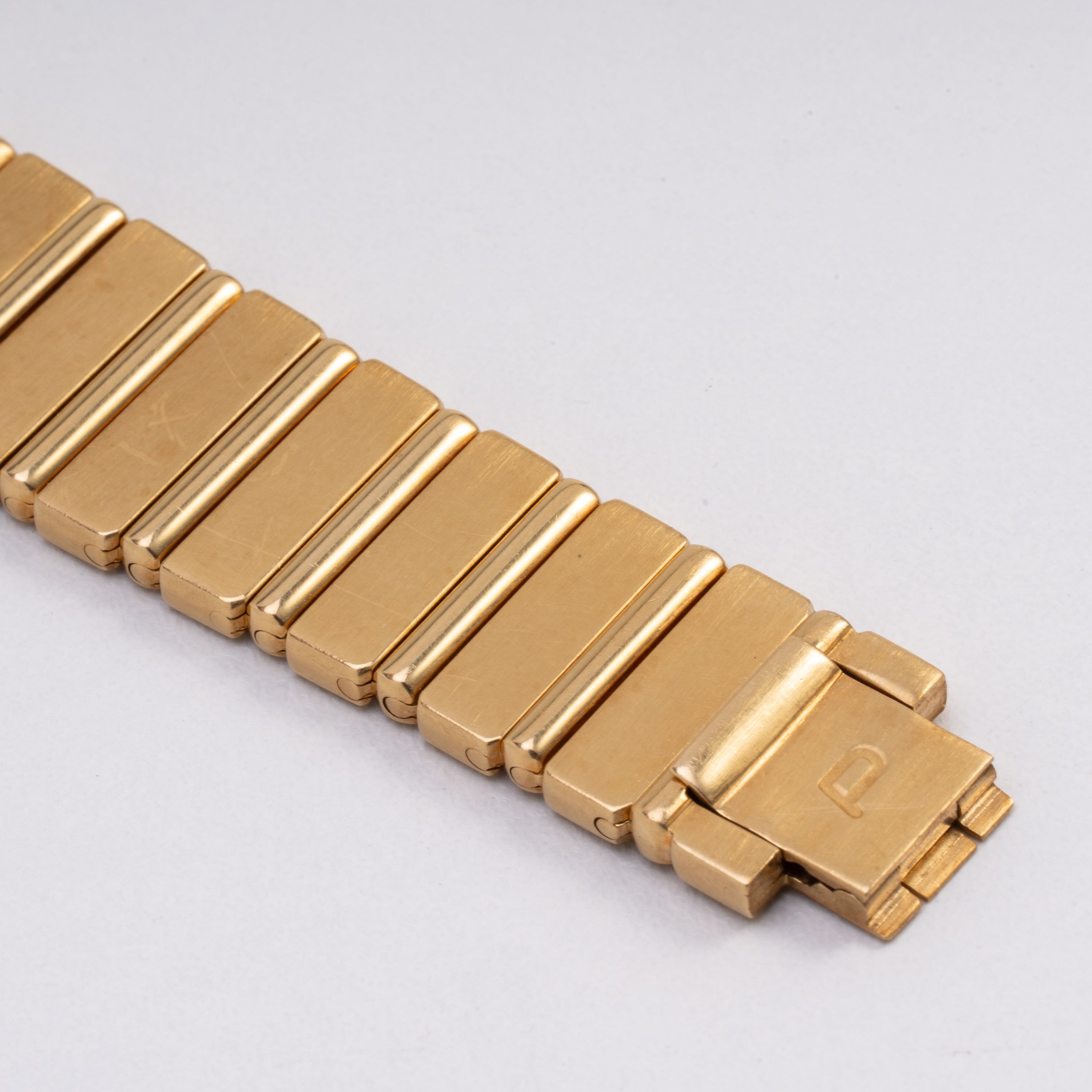 Piaget, Polo, orologio da polso solo tempo in oro giallo 18kt con bracciale integrato