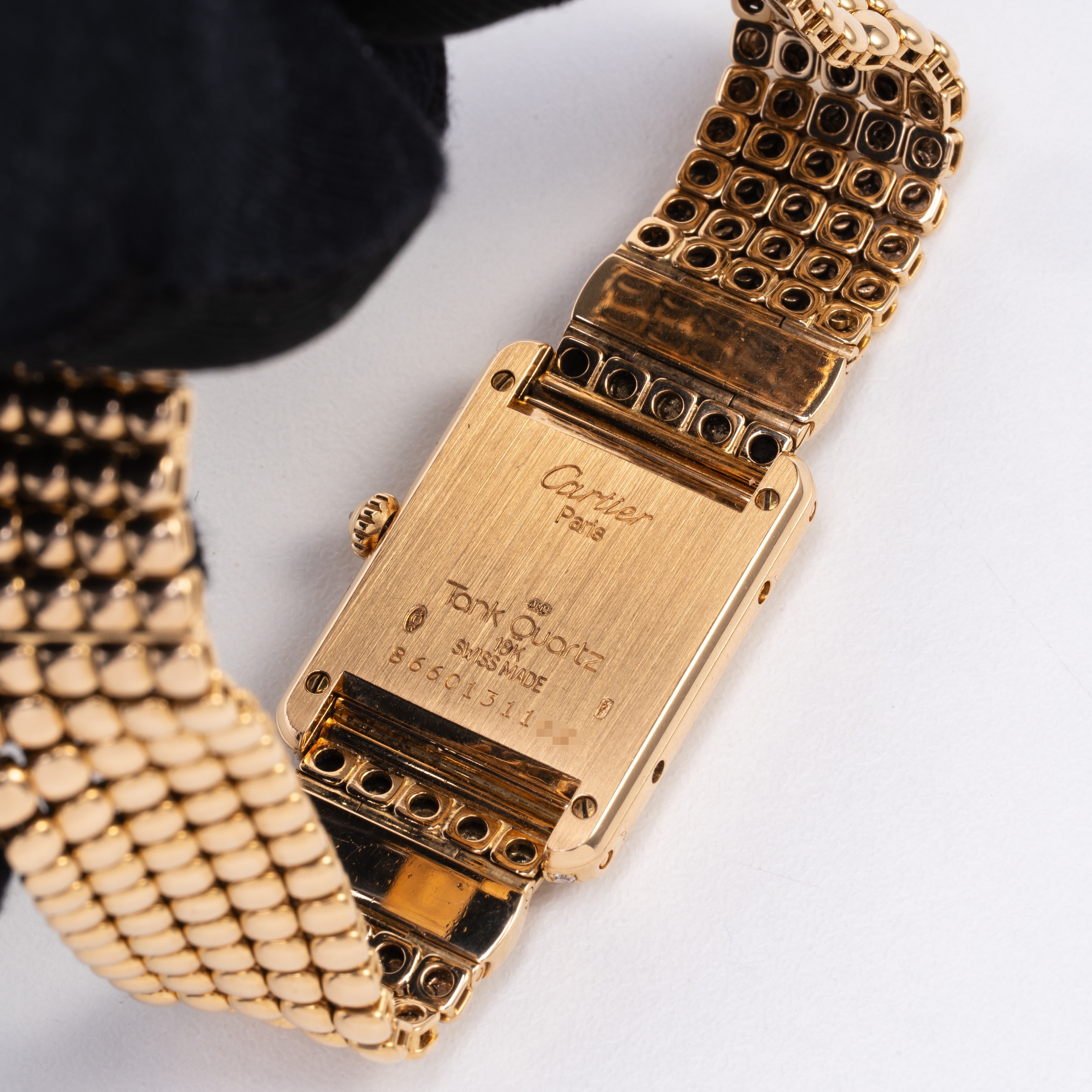 Cartier - Tank, orologio solo tempo al quarzo in oro giallo 18 kt con ghiera in diamanti e bracci...