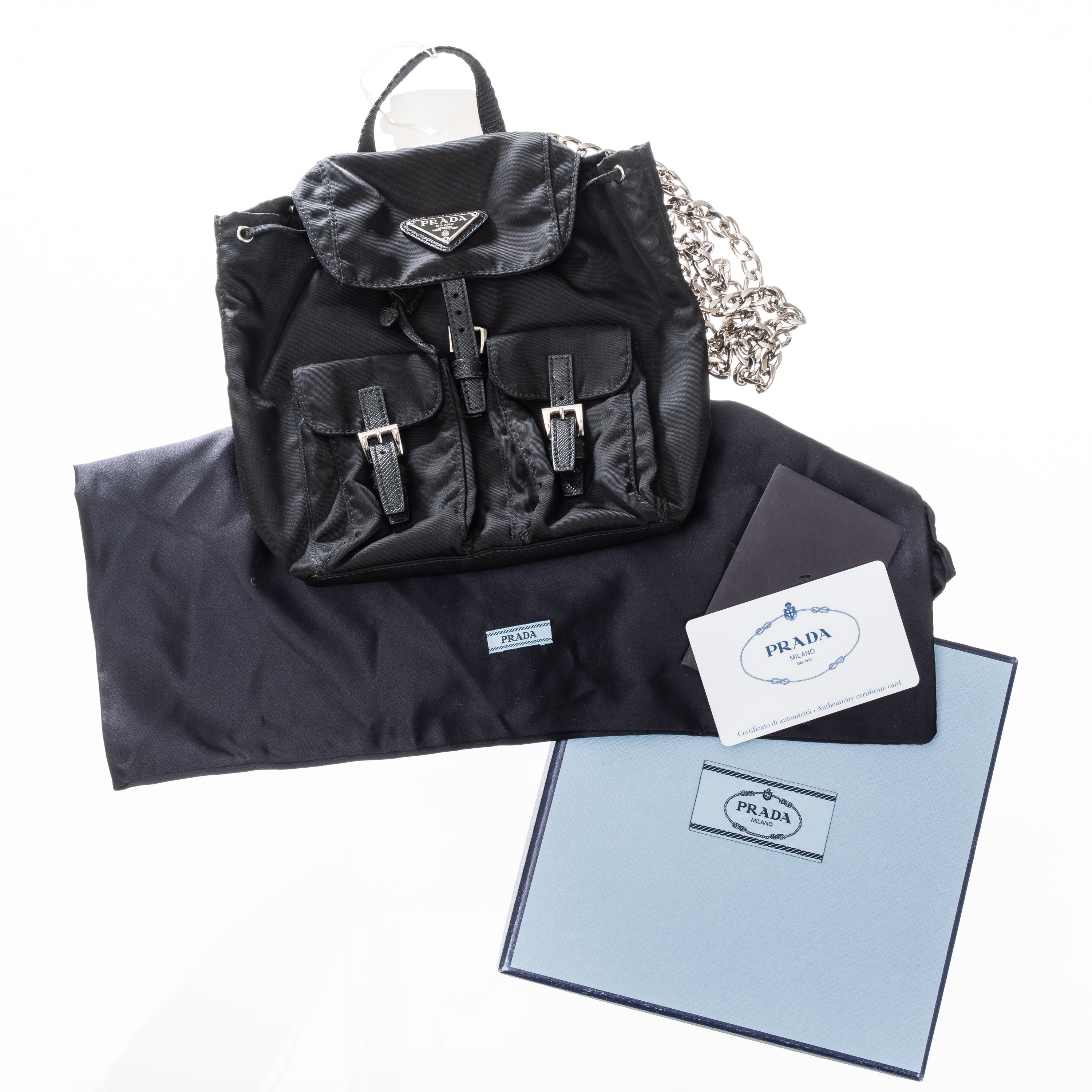 Prada - Mini zaino Re-Edition in tela vela con dettagli Saffiano