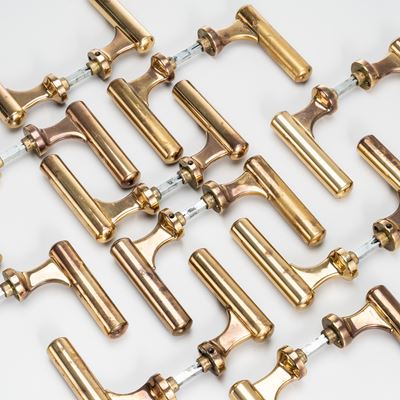 Set di dieci coppie di maniglie in ottone
