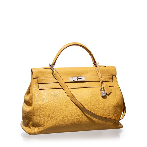 HERMÈS - HERMÈS KELLY 40 RETOURNÉ CLEMENCE COLORE JAUNE PHW - 2009