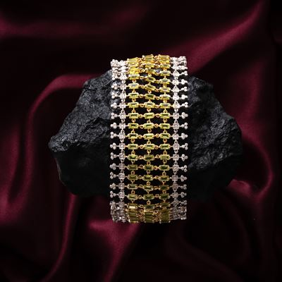 Bracciale in oro giallo e bianco 14 kt con peridoti e diamanti