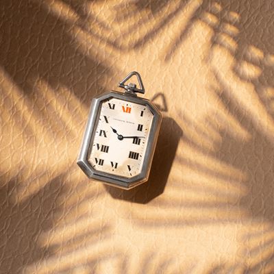 Orologio da tasca ottagonale in argento a carica manuale con quadrante bianco