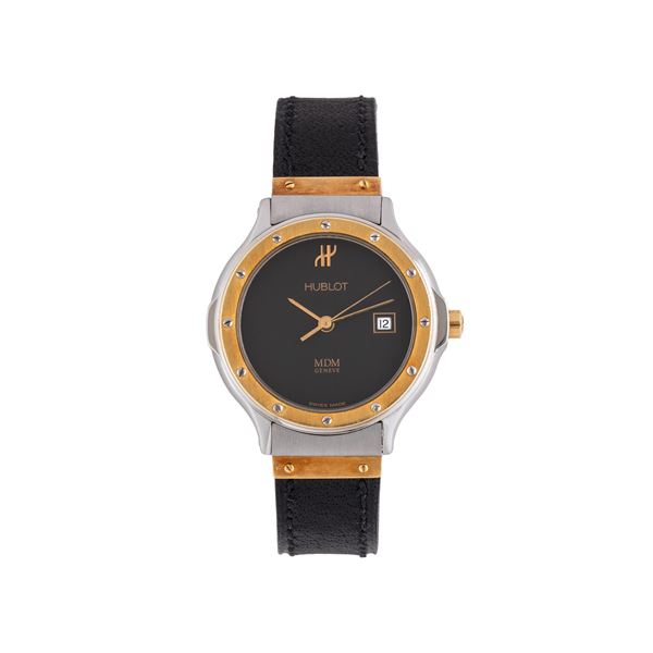 HUBLOT - HUBLOT - MDM OROLOGIO SOLO TEMPO AL QUARZO IN ACCIAIO E ORO GIALLO 18 KT CON QUADRANTE NERO, SECONDI CENTRALI E DATARIO AD ORE TRE.
