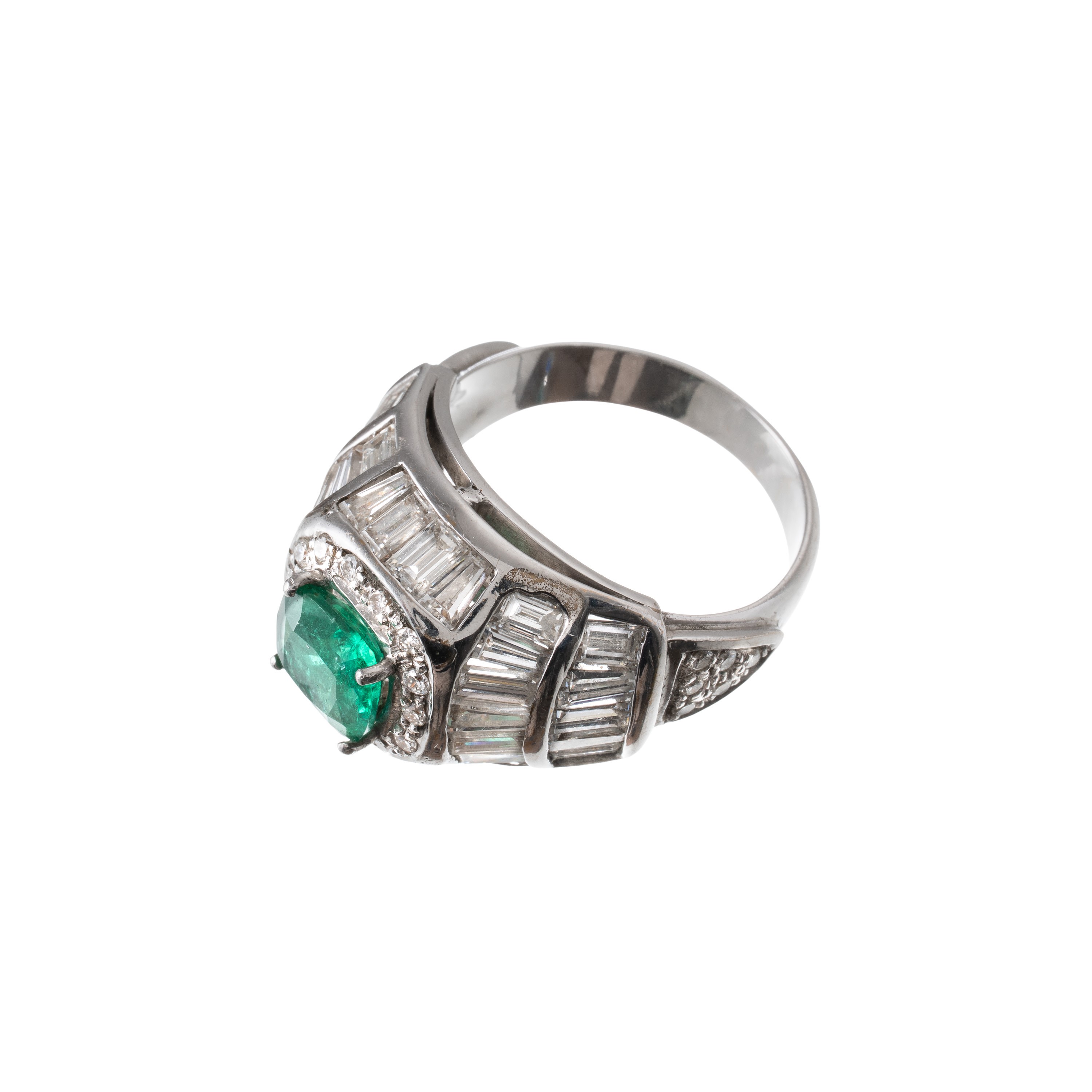 Anello in oro bianco 18 kt con diamanti e smeraldo