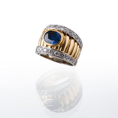 Anello in oro 18 kt bicolore con zaffiro intense blue e brillanti