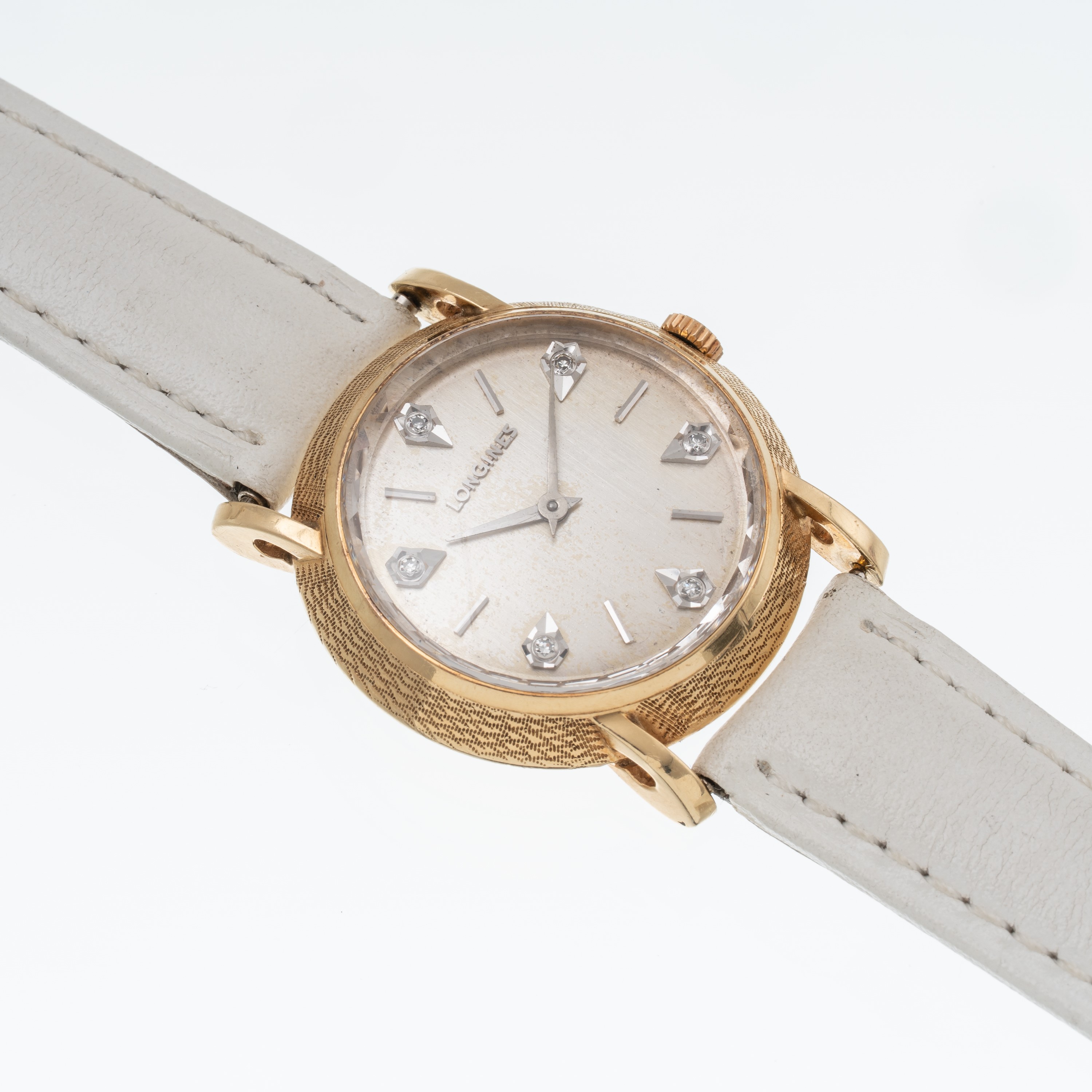 Longines - Orologio solo tempo in oro giallo 14 kt con quadrante argenté, riferimento 207