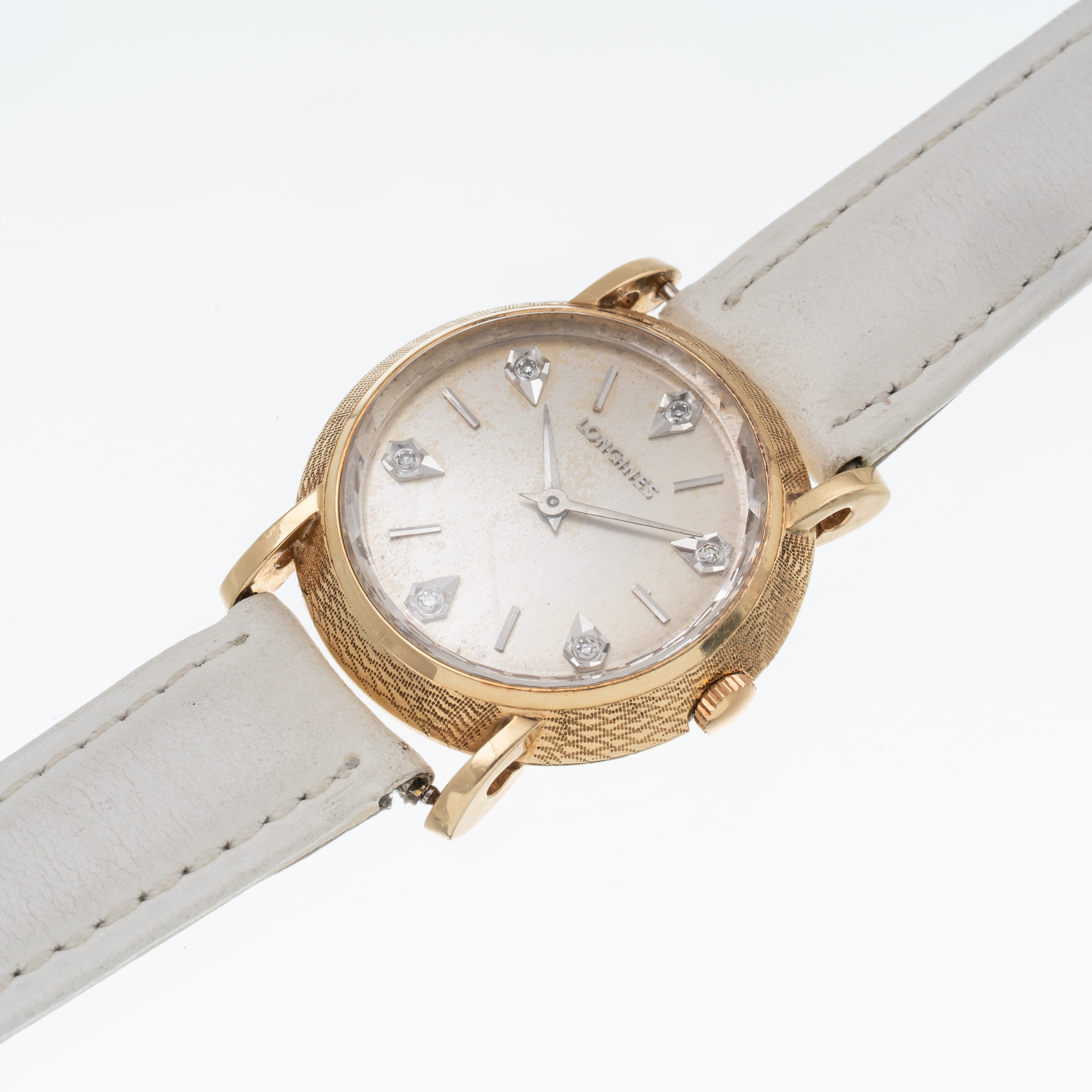 Longines - Orologio solo tempo in oro giallo 14 kt con quadrante argenté, riferimento 207