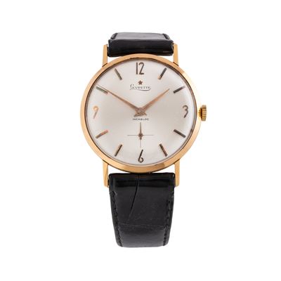 Orologio solo tempo a carica manuale in oro giallo 18 kt con quadrante argenté e piccoli secondi