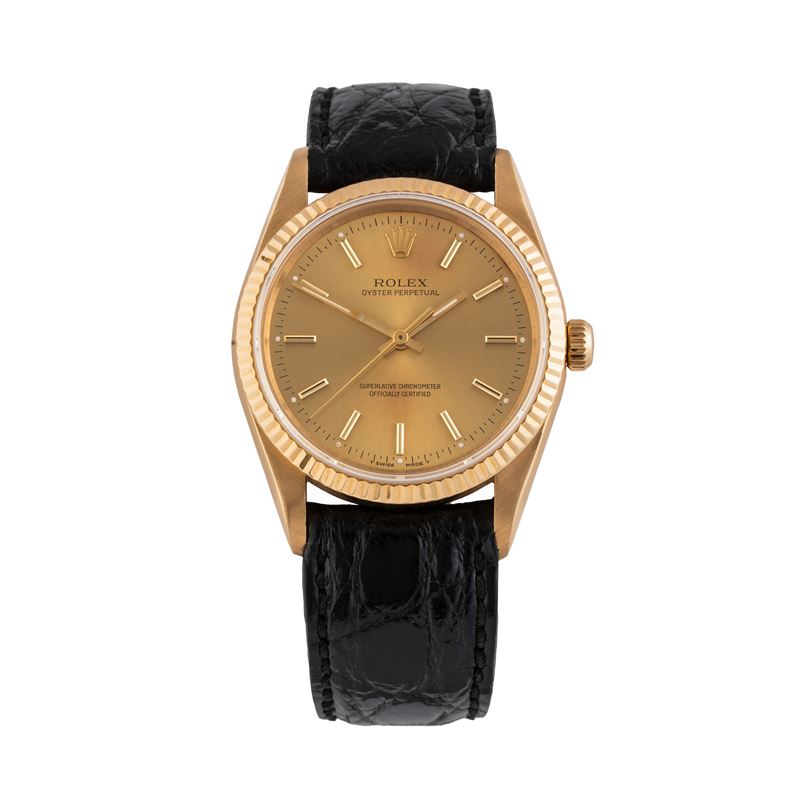 Rolex - Oyster Perpetual 14238, Solo Tempo automatico in oro giallo 18 kt con quadrante champagne