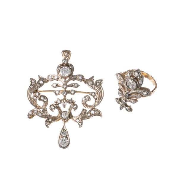 SPILLA E ANELLO IN ORO GIALLO 18 KT CON CONTORNO DI DIAMANTI