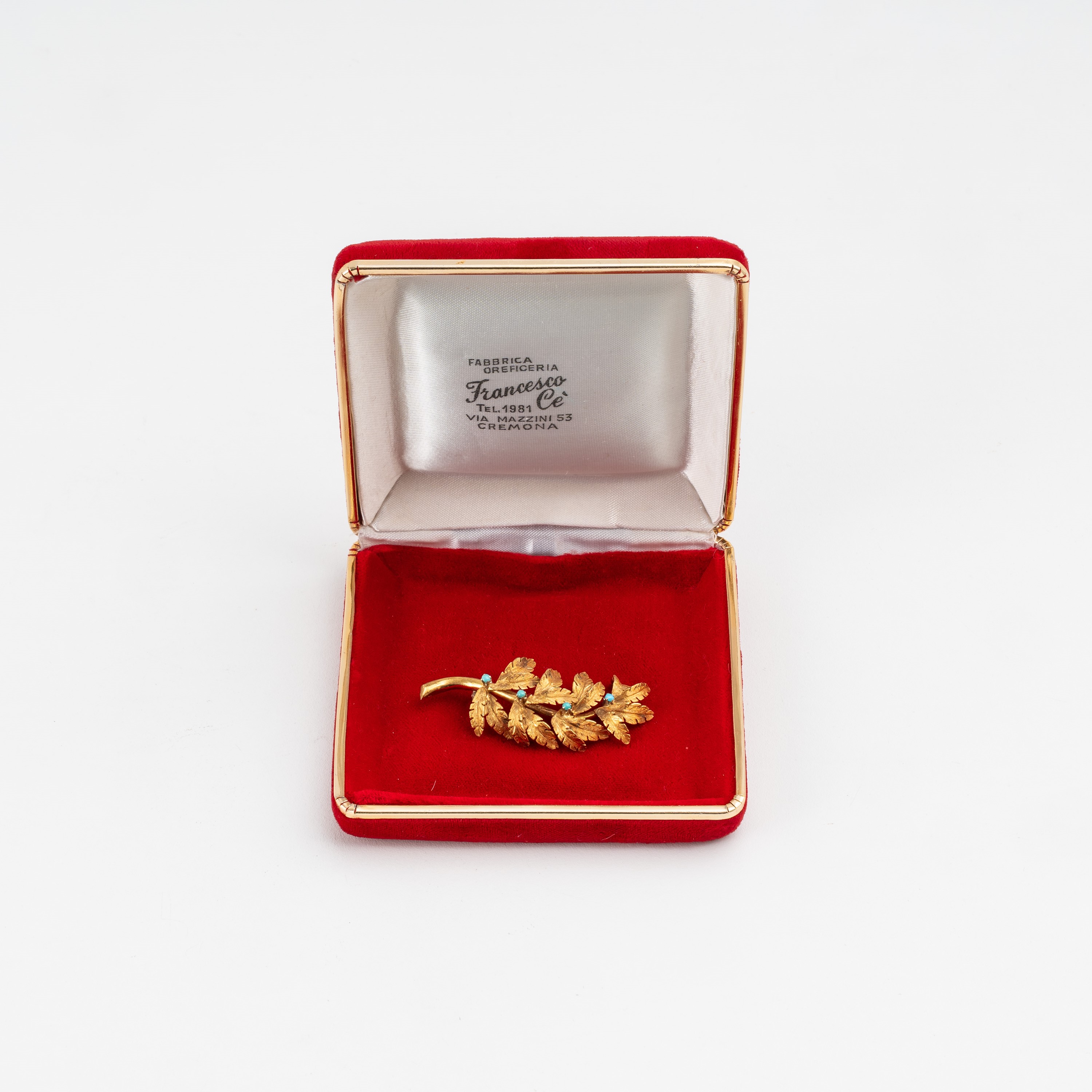 Spangaro, Spilla in oro giallo 18 kt a foglia con turchese