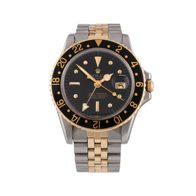 Rolex - GMT Ref. 1675, orologio GMT automatico acciaio e oro giallo 18 kt (1972)