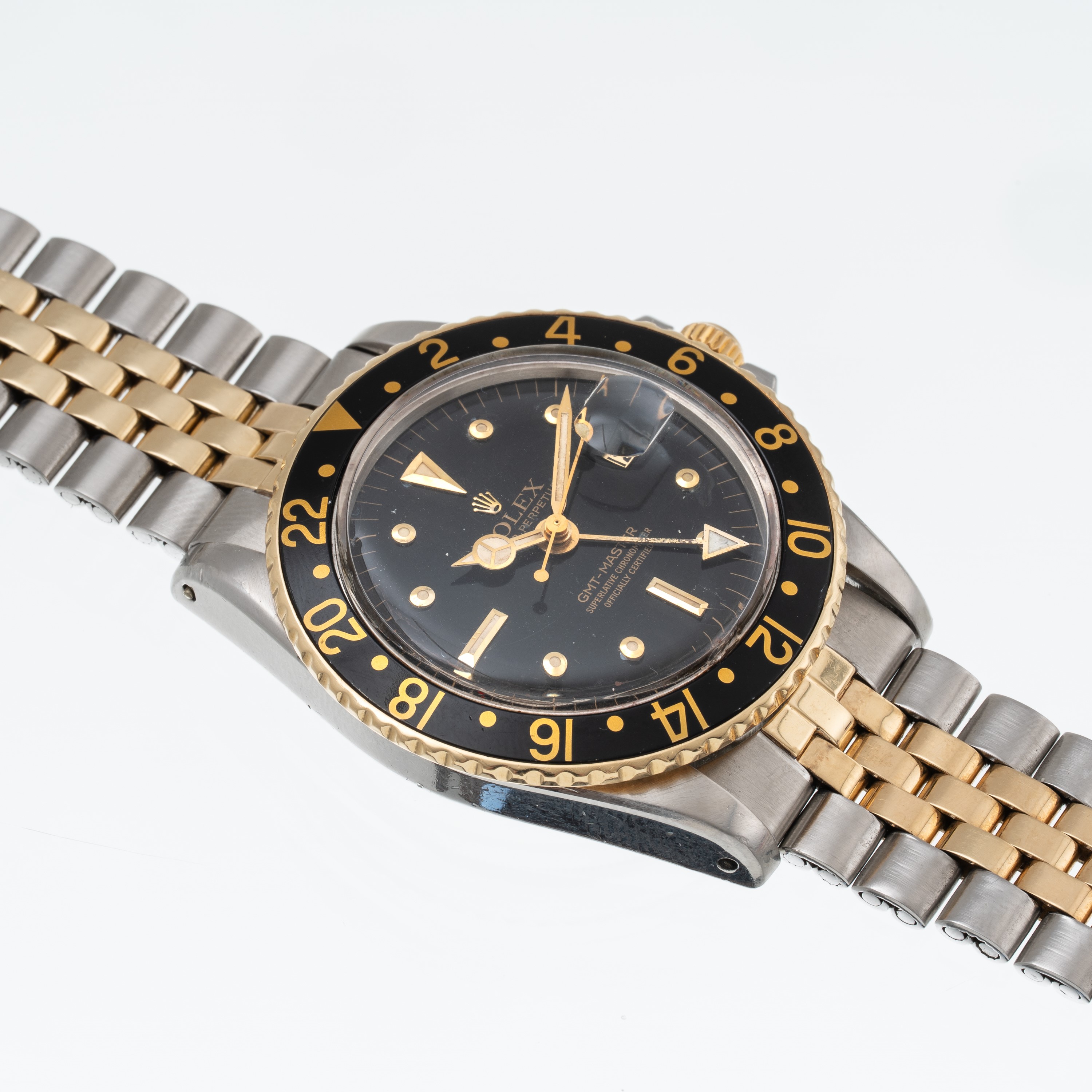 Rolex - GMT Ref. 1675, orologio GMT automatico acciaio e oro giallo 18 kt (1972)