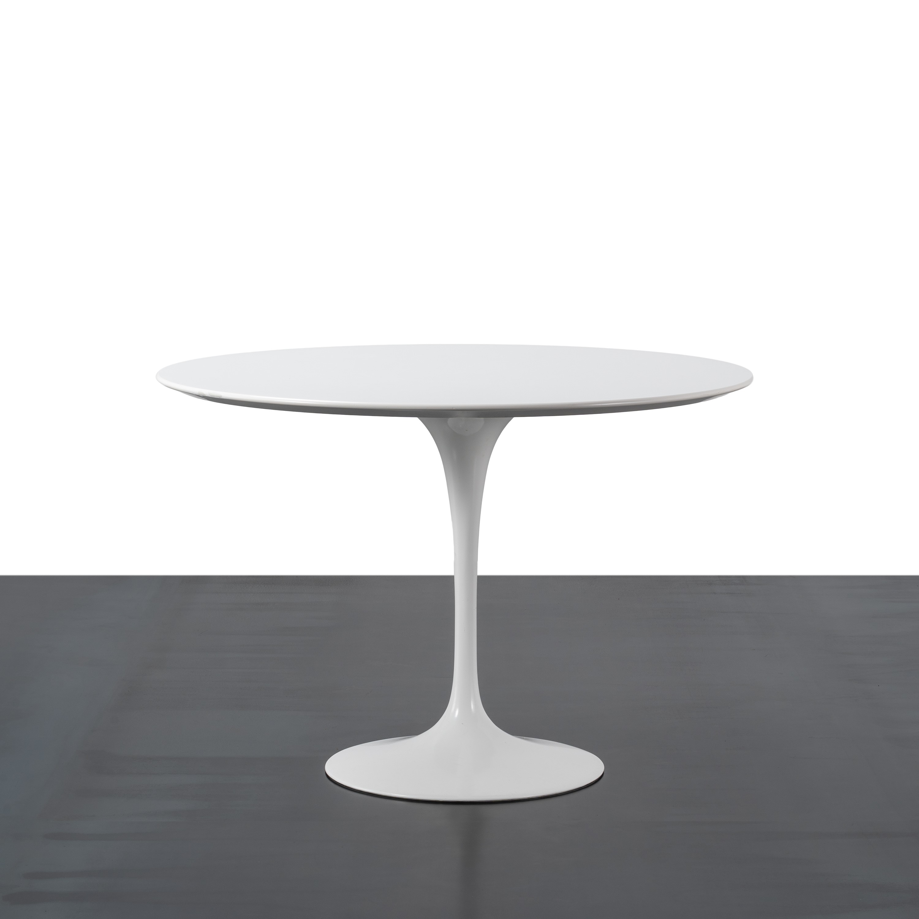 Eero Saarinen - Tavolo “Tulip”, piano in laminato e base in alluminio