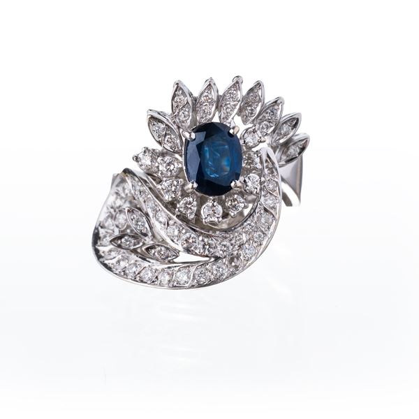 ANELLO IN ORO BIANCO 18KT CON ZAFFIRO E DIAMANTI