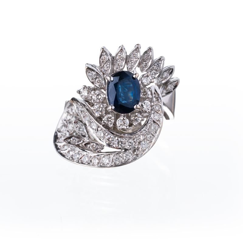 Anello in oro bianco 18 kt con zaffiro e diamanti
