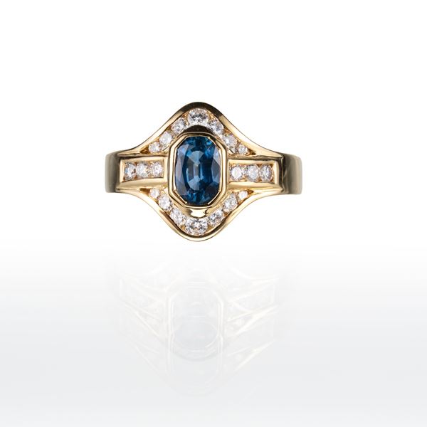 ANELLO IN ORO GIALLO 18KT CON ZAFFIRO E DIAMANTI TAGLIO BRILLANTE