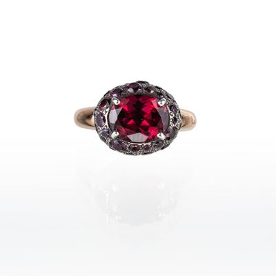 Anello Tabù in oro rosa 18 kt con granati rodolite