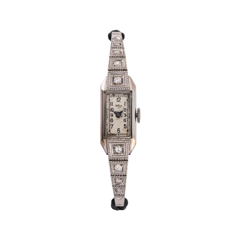 Nobelt, Orologio “Art Decò” solo tempo a carica manuale in oro bianco 18 kt con brillanti