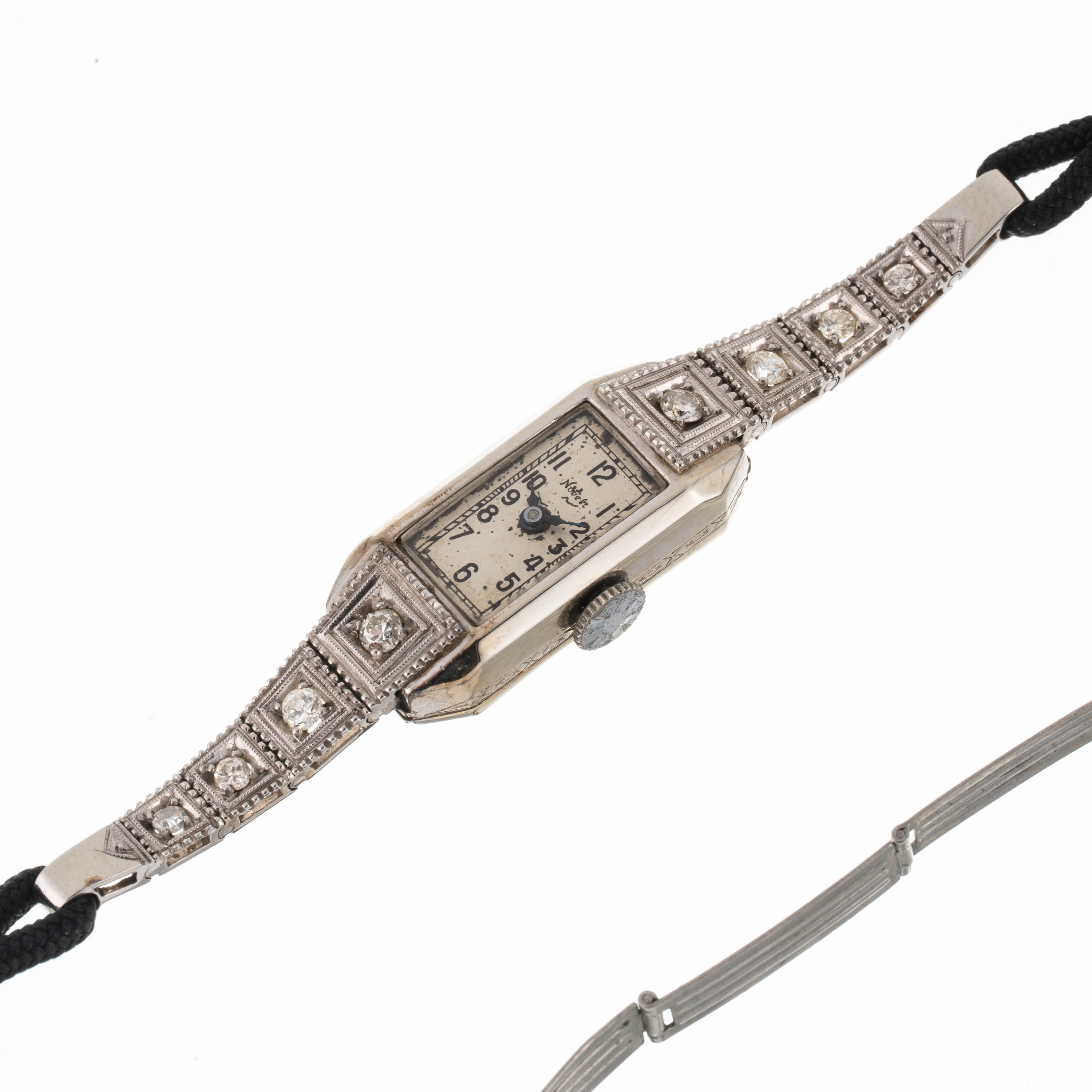 Nobelt, Orologio “Art Decò” solo tempo a carica manuale in oro bianco 18 kt con brillanti