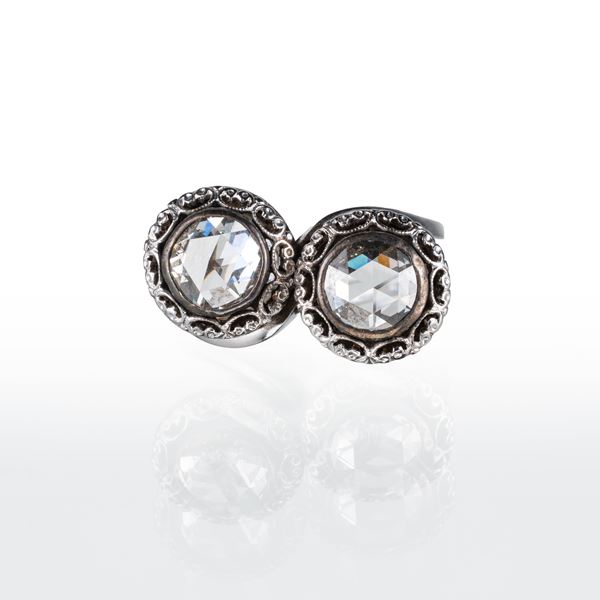 ANELLO IN ORO BIANCO 18 KT CONTRARIÈ CON DUE DIAMANTI