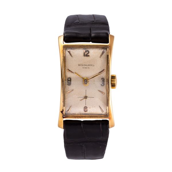 PATEK PHILIPPE - PATEK PHILIPPE - HOUR GLASS OROLOGIO SOLO TEMPO A CARICA MANUALE IN ORO GIALLO 18KT CON CASSA DI FORMA E QUADRANTE ARGENTE'