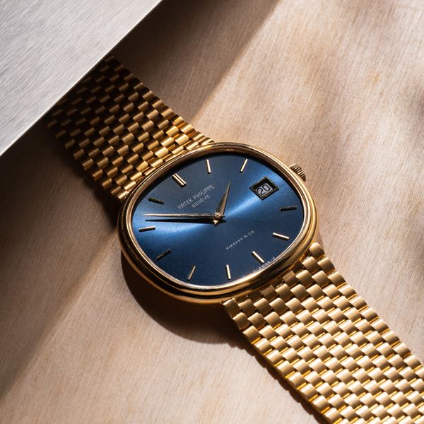 PATEK PHILIPPE - ELLIPSE OROLOGIO A CARICA AUTOMATICA IN ORO GIALLO 18KT CON BRACCIALE INTEGRATO IN  [..]