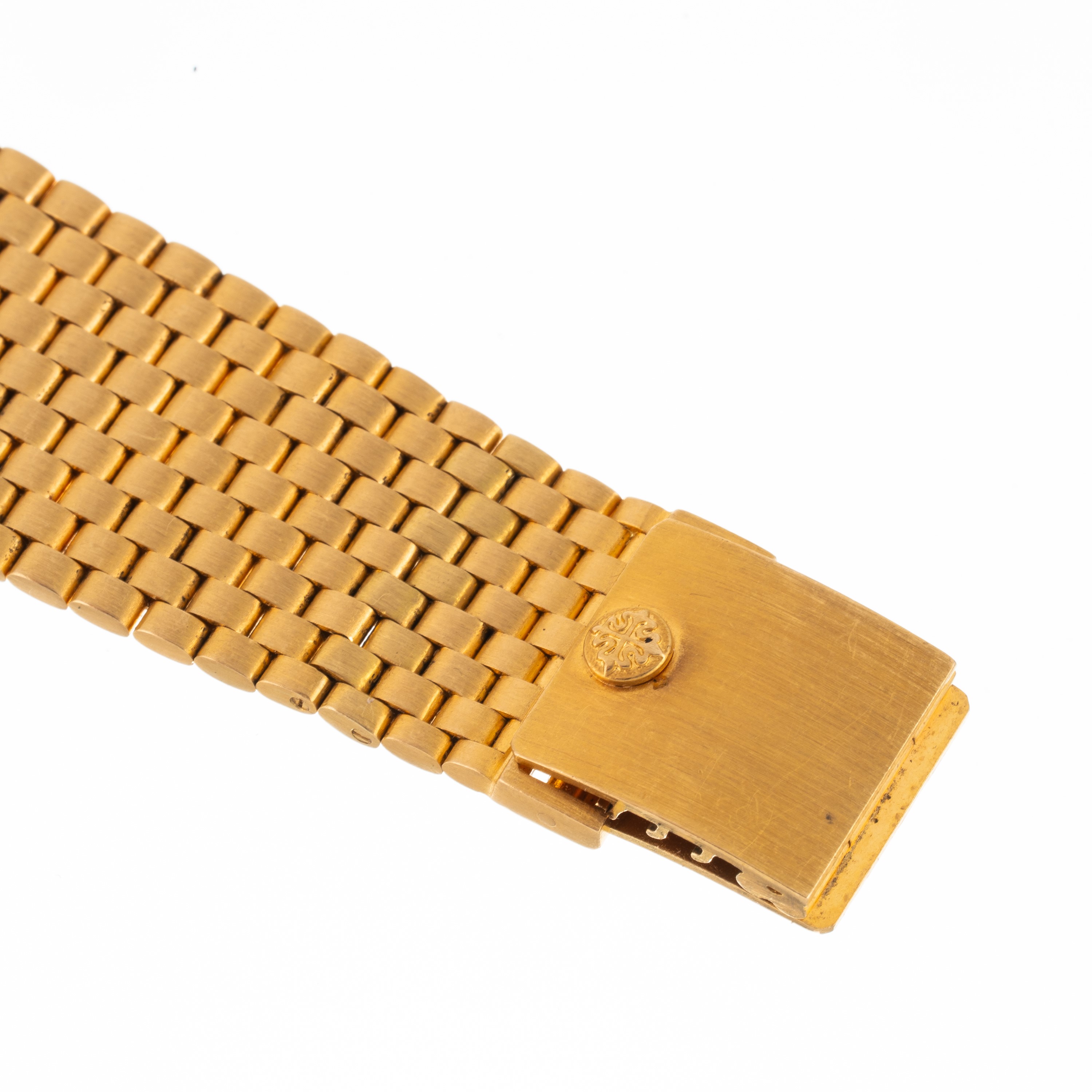 Patek Philippe - Orologio Ellipse ref. 3839/1J a carica automatica in oro giallo 18 kt con bracci...