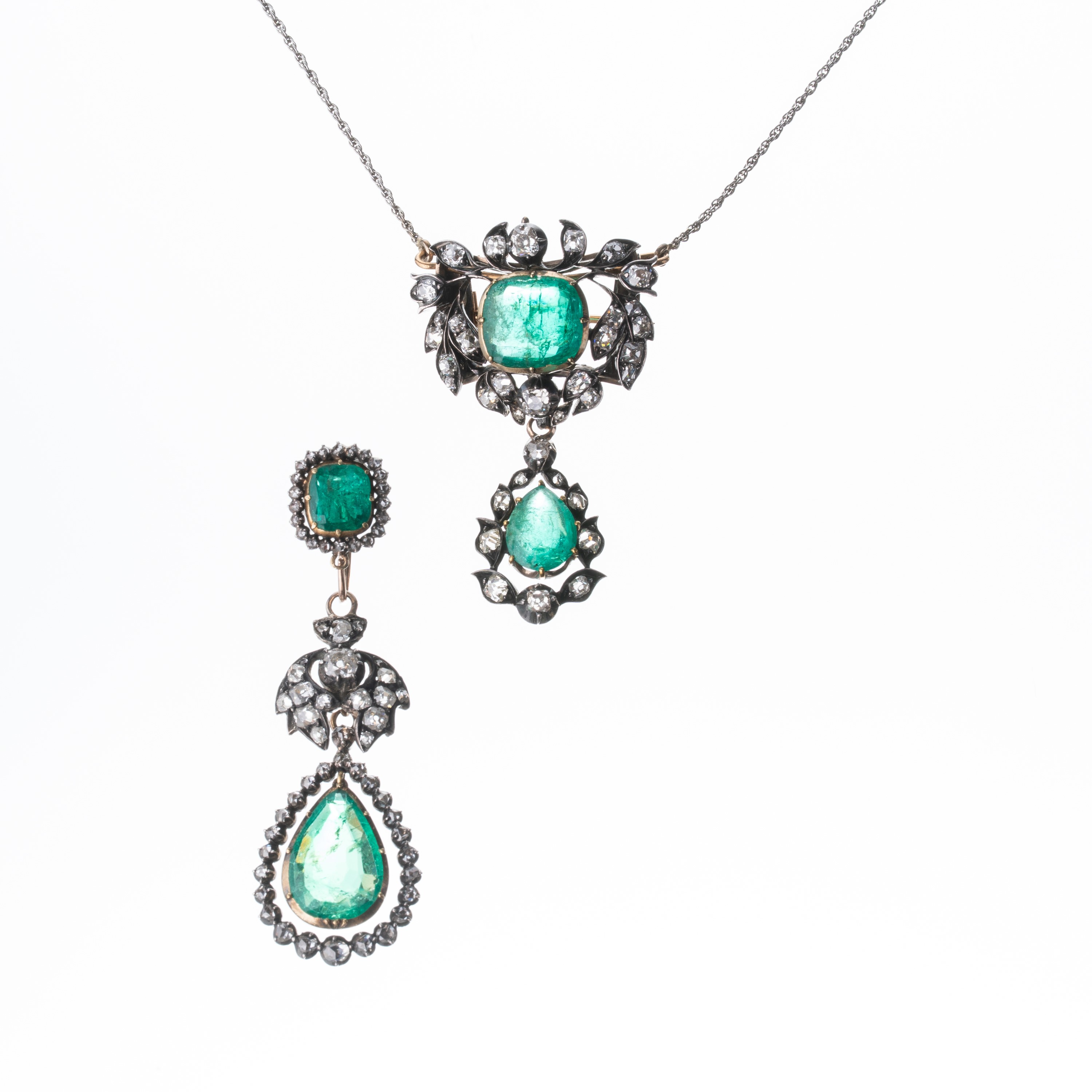 Parure in oro bianco 18 kt e argento, girocollo ed orecchini con smeraldi e diamanti