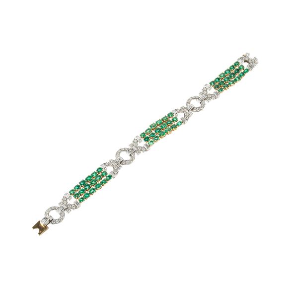BRACCIALE IN ORO BIANCO 18 KT CON SMERALDI E DIAMANTI